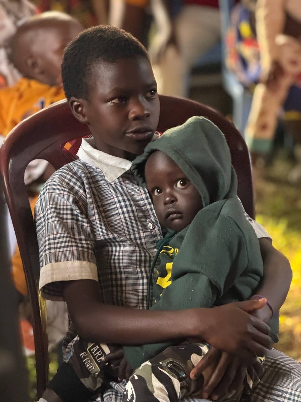 Medical workers providing vaccines to children